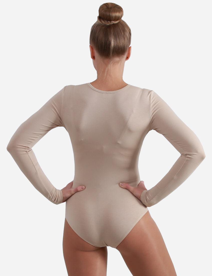 Back view of a ballet dancer in a nude leotard with a modest scoop neck and three-quarter sleeves.