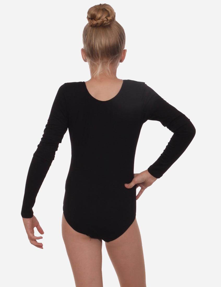 Back view of a child gymnast in a black long-sleeve leotard with hair in a bun, white backdrop.