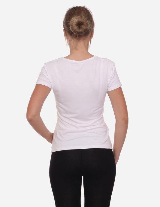 Back view of a woman in a V-neck white t-shirt and black leggings, standing on a white background
