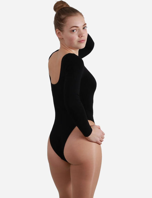 A black long-sleeved leotard worn by a woman, capturing the essence of dance attire.