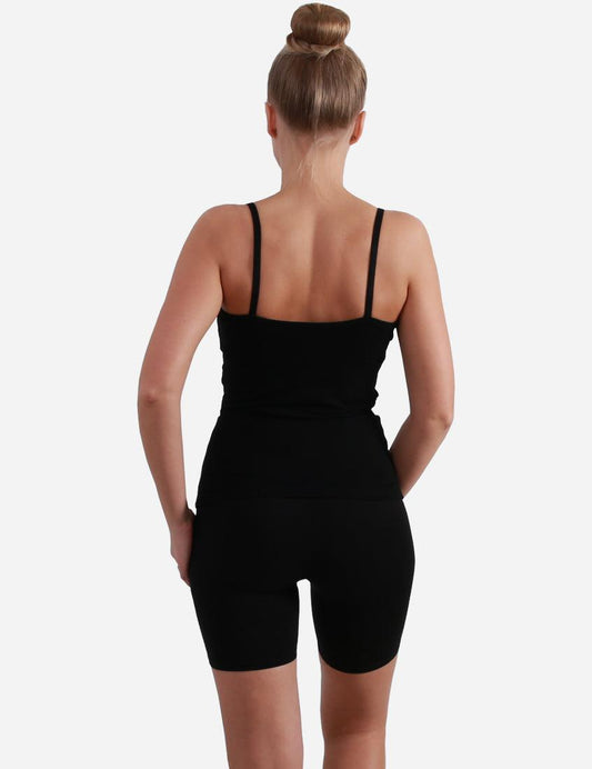 Back view of a woman in a black tank top and cycling shorts, showcasing the fit and design against a white background.
