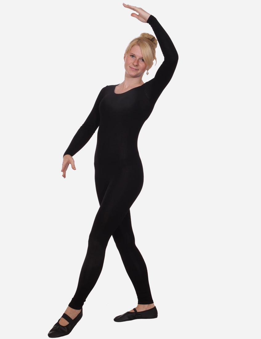 Blonde woman in a long-sleeve black cat costume performing a dance move with an arm extended overhead, isolated on white background.