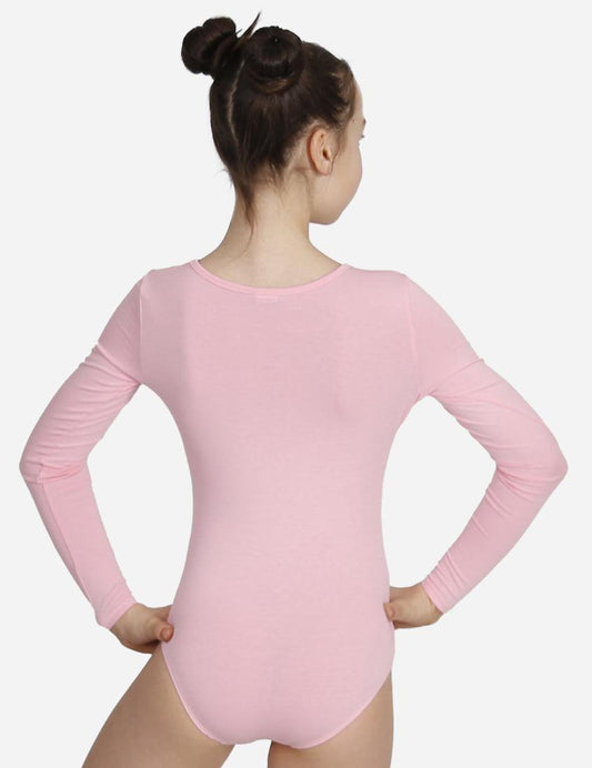 Back view of a child in a pink leotard with three-quarter sleeves and hair in a bun