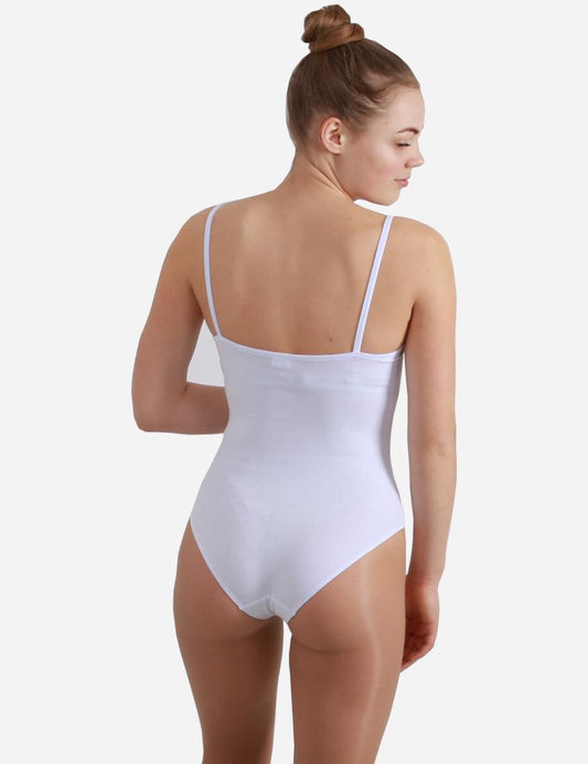 Rear view of a woman wearing a white leotard with straps, showcasing the fit and hairstyle in a bun.