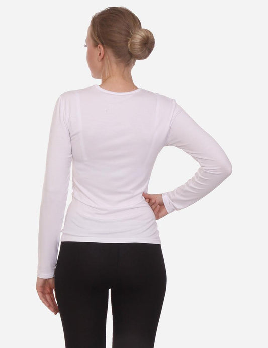 Woman in a white long-sleeved shirt and black leggings from the back, standing on a white background