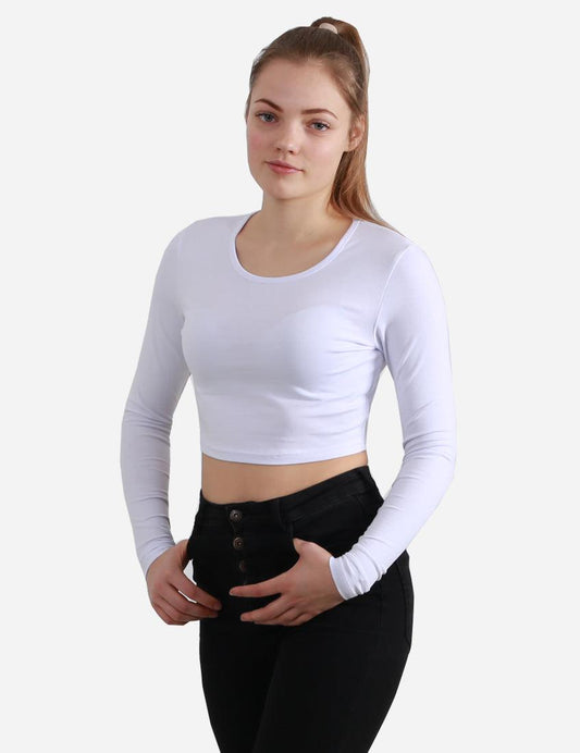 Woman in white long sleeve cropped top and black high-waisted pants, partial front view on white background