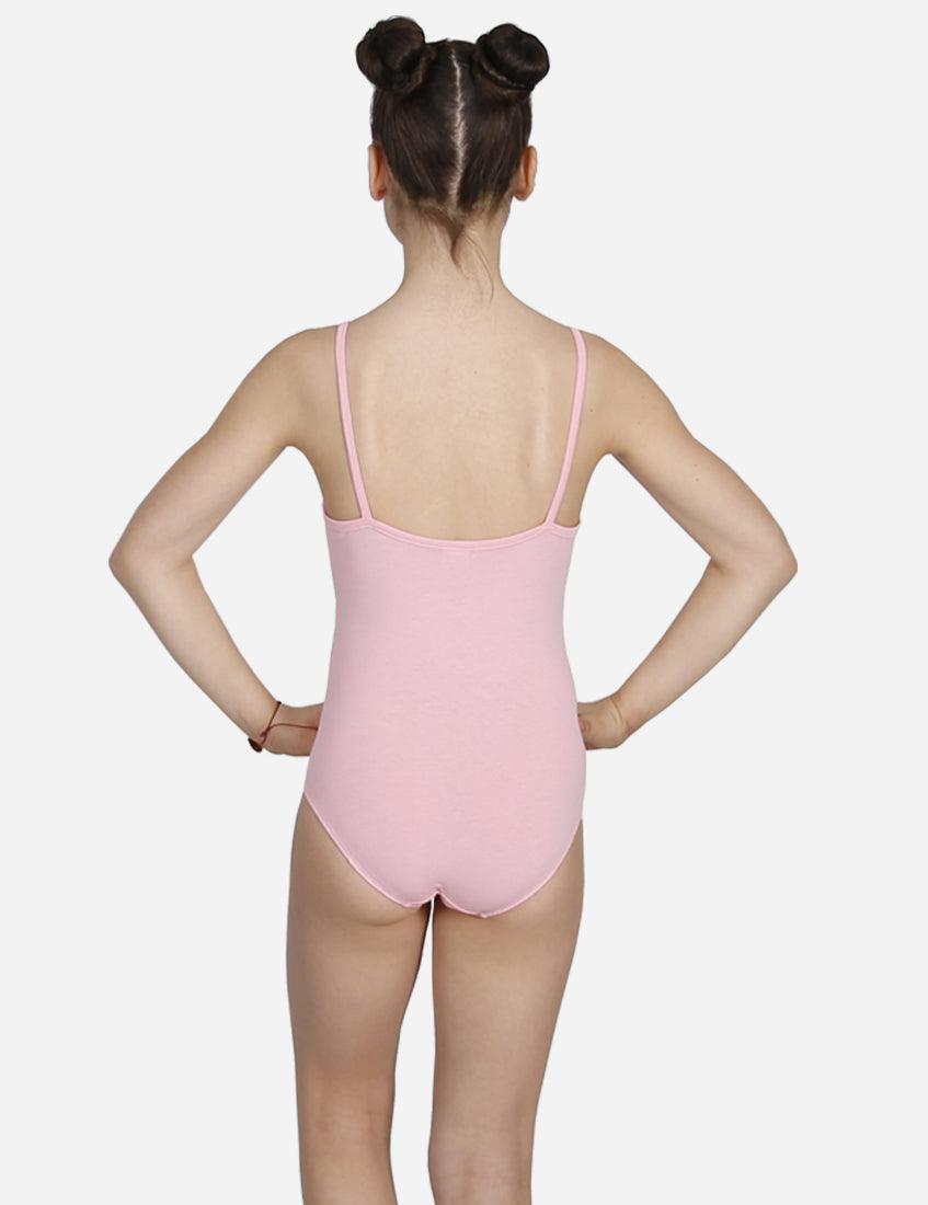Rear view of a young girl in a pink spaghetti strap leotard with a ballet bun hairstyle